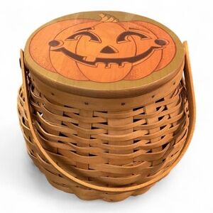 Longaberger Round smiling jack-o’-lantern lidded basket with handle